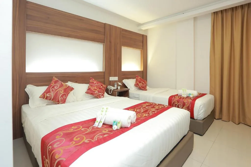 Deluxe Triple Room — Bitz Bintang Hotel